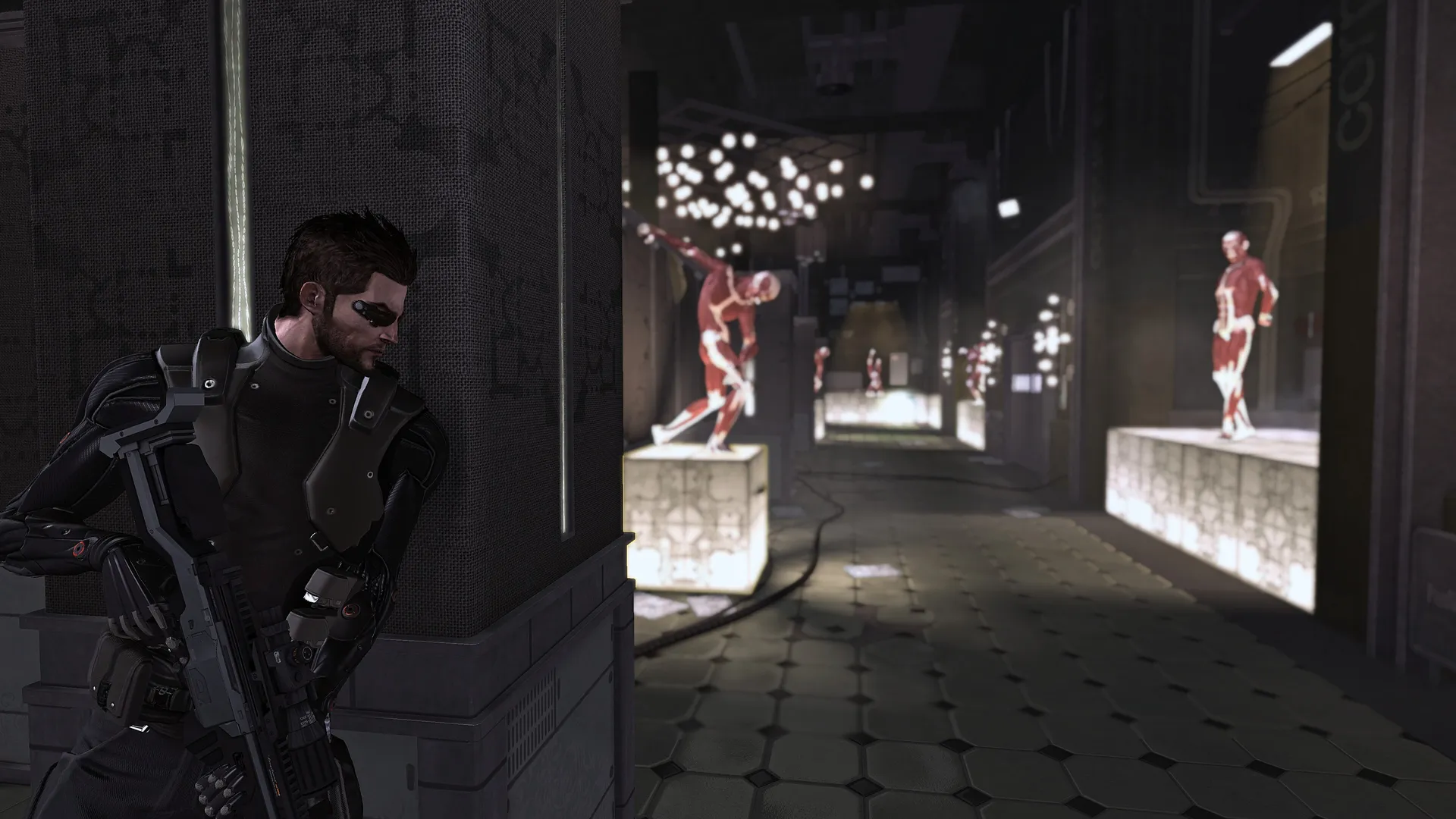 Adam Jensen peers round a pillar in Deus Ex: Human Revolution